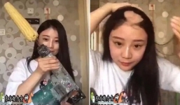 Video: Cô gái bay mất mảng tóc vì ăn ngô bằng máy khoan