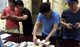 Bắt khẩn cấp cặp vợ chồng lưu hành, mua bán 400 triệu đồng tiền giả