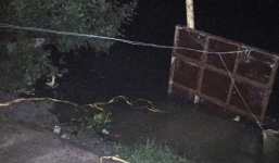 Nhảy xuống hồ cứu cháu, ông nội mắc kẹt trong cống tử vong