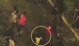 Cô gái la hét hoảng hốt khi bị một nhóm đàn ông vây đánh tập thể