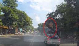 Video: Thanh niên nghi 'ngáo đá' lao ra đường, nhảy lên nóc ôtô đang chạy
