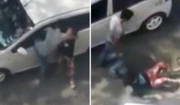 Cô gái bị đánh tới tấp trên phố, người chung quanh thản nhiên đứng xem