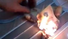 Đề nghị Trung Quốc xử lý khách đốt tiền Việt tại Đà Nẵng