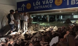 Tường hầm chung cư bất ngờ đổ sập, chôn vùi nhiều ô tô, xe máy