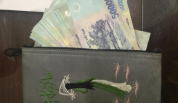 Bị truy đuổi, tên cướp vứt chiếc túi có gần 30 triệu đồng