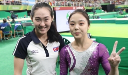 Vận động viên Triều Tiên và Hàn Quốc chụp ảnh cùng nhau tại Olympic 2016