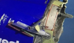 Máy bay nổ động cơ giữa trời, 99 hành khách hoảng loạn