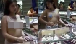 Tiệm trang sức bắt nữ nhân viên cởi trần đứng bán kim cương