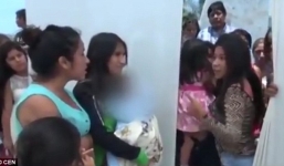 Bế con mới sinh đến đám cưới để tố chú rể phản bội