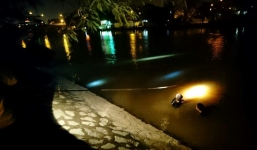 Nữ kiểm sát viên kéo 2 con nhảy sông Sài Gòn tự tử