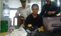 Hành khách Trung Quốc trộm 400 triệu đồng trên máy bay