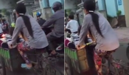 Mẹ nghèo còng lưng đèo con đến lớp bằng xích lô gây xúc động
