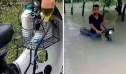 'Tròn mắt' với xe máy lội nước như tàu ngầm