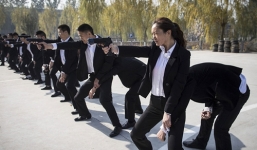 Vệ sỹ Trung Quốc thu nhập 3.000 USD dần bị mất việc