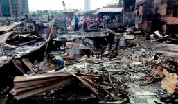 Người mẹ ôm 2 con nhỏ chạy khỏi đám cháy kinh hoàng ở Nha Trang