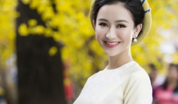 Á hậu Hà Thu mặc áo dài truyền thống đi xin chữ đầu năm