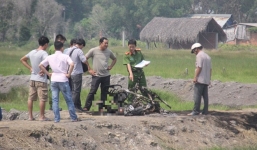 Thi thể người đàn ông cháy đen, co quắp cạnh xe tay ga ở Sài Gòn