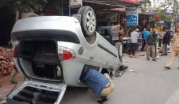 Đi lễ chùa về, xế hộp gặp nạn lật chổng vó