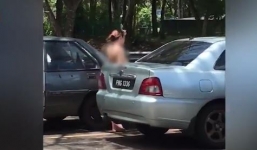 Video: Người phụ nữ khỏa thân đi giữa đường, nghi ngáo đá