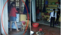 Hiệu trưởng và 2 cô giáo dọa cắm điện, bế ngược bé trai vào máy vặt lông gà