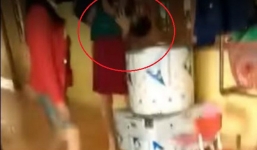 Cô hiệu trưởng dốc đầu bé trai vào máy vặt lông gà bị tạm đình chỉ công tác