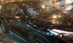 Người phụ nữ dùng bút xóa vẽ lên ô tô bị phạt 13 triệu