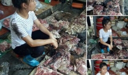 Cả sạp thịt lợn bán giá rẻ của người phụ nữ trẻ bị hất đầy dầu luyn