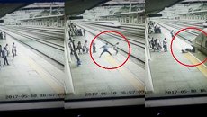 Video hot: Nhân viên ga tàu nhanh trí cứu cô gái định tự tử 