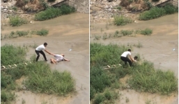 Cô gái quằn quại đòi tự tử ở vùng nước ngập chưa đến đầu gối