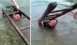 Cha trói con vào thang, dìm xuống nước để 'dạy dỗ' gây phẫn nộ