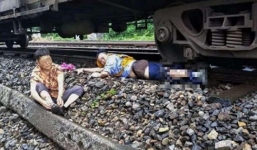 Người lái tàu mất một chân vì cứu người phụ nữ băng qua đường ray