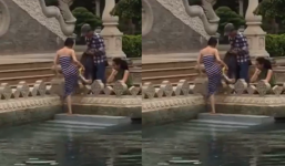 Tưởng mình là công chúa, cô gái trẻ vô tư bơi tại hồ nước trong chùa