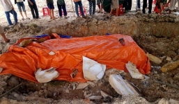 Phát hiện mộ cổ bằng đá nguyên khối khi san lấp mặt bằng