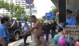 Tài xế taxi dù cởi quần áo, cầm dao rượt đuổi TTGT gây náo loạn