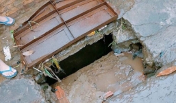 Một học sinh mất tích khi bị nước cuốn trôi xuống cống