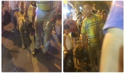 Thanh niên thả chó dữ chạy rong phố đi bộ còn định đánh người