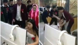 Cô dâu mải chơi game, cả nhà phải đến tận quán net lôi về để... làm lễ cưới