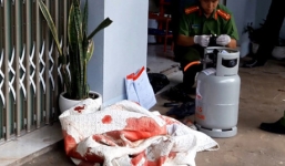 Cảnh sát phun vòi rồng khống chế tên giết người ôm bình gas cố thủ