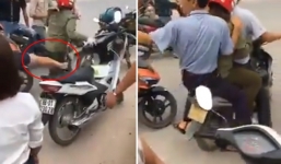 Người phụ nữ bị dân vây đánh vì nghi bắt cóc trẻ con