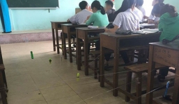 Màn giăng dây như ma trận để cô giáo không thể đi xuống kiểm tra vở của HS cấp 3