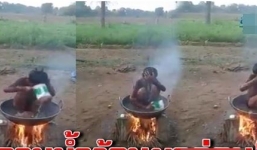 Sự thật hình ảnh bé trai ngồi trong nồi nước sôi trên bếp khiến dư luận phẫn nộ