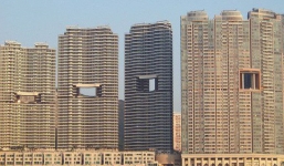 Bí mật thú vị đằng sau những 'lỗ hổng' siêu to ngay giữa các ngôi nhà cao tầng ở Hồng Kông