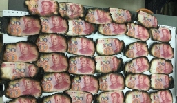 Đốt than sưởi ấm, cụ ông vô tình đốt cháy gần 40 triệu đồng tiền mặt