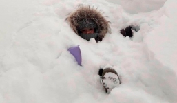 Nếu chịu lạnh kém, bạn không nên tới thành phố với nhiệt độ -55 độ C, tuyết ngập cả đầu người này