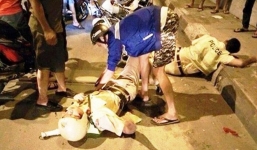 Thanh niên quật ngã công an xuống đường sau khi vượt đèn đỏ