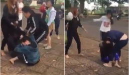 Nhóm nữ sinh dùng mũ bảo hiểm phang tới tấp vào đầu bạn giữa đường