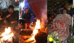 Trắng đêm ngồi co ro đốt củi sưởi ấm để canh đào, quất, hoa Tết