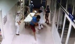 Bệnh nhân đánh cán bộ y tế đang mang thai vì phải đi lòng vòng làm thủ tục