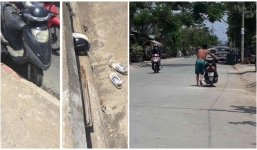 Người đàn ông giữa trưa lên cầu bỏ lại xe máy nhảy xuống sông, sau đó bình thản bơi vào bờ rồi dắt xe về