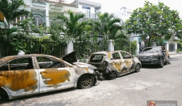 Hàng trăm xe máy, ô tô hạng sang bị cháy trơ khung tại chung cư Carina được kéo ra ngoài bán sắt vụn